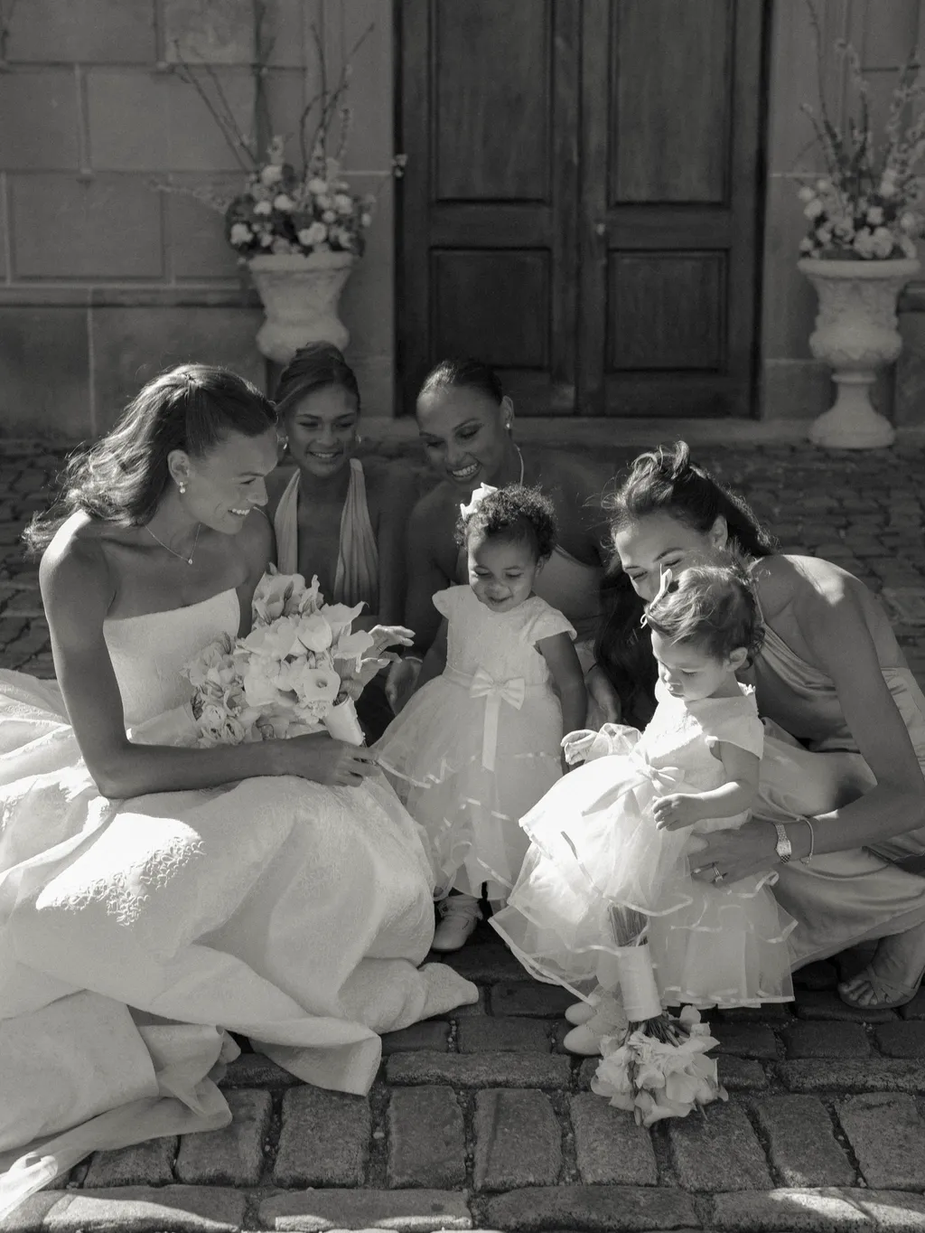 Image may contain Clothing Dress Flower Flower Arrangement Flower Bouquet Plant Formal Wear Fashion and Gown