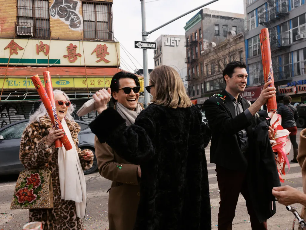 Image may contain Clothing Coat City Road Street Urban Accessories Sunglasses Jacket Adult Person and People