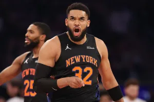NEW YORK, NEW YORK - APRIL 10: Karl-Anthony Towns #32 of the New York Knicks reacts after dunking the ball during the first quarter against the Toronto Raptors at Madison Square Garden on April 10, 2026 in New York City. NOTE TO USER: User expressly acknowledges and agrees that, by downloading and or using this photograph, User is consenting to the terms and conditions of the Getty Images License Agreement. (Photo by Pamela Smith/Getty Images)
