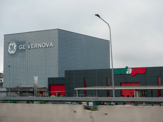 GE Vernova and Sodagas buildings along Autostrada A4 in northern Italy showing industrial architecture
