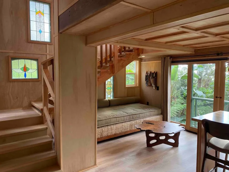 Image may contain Wood Furniture Indoors Interior Design Bed Bedroom Room Hardwood Stained Wood and Electronics