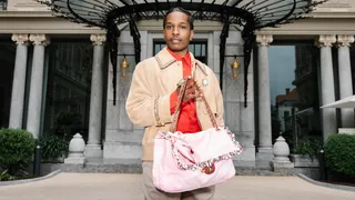 Image may contain AAP Rocky Accessories Bag Handbag Purse Person Clothing and Coat