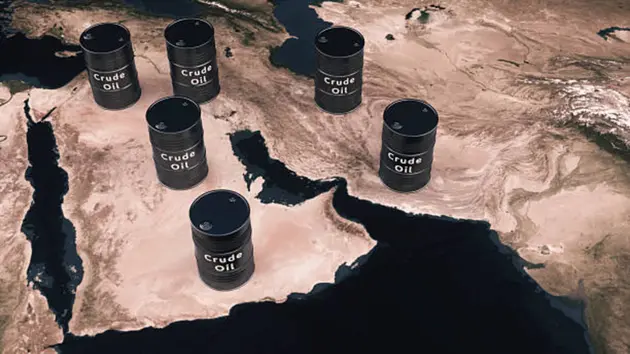 Abstract Persian Gulf map composition with crude oil barrels