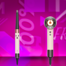 pink dyson airwrap i.d. and dyson supersonic nural on dark pink background