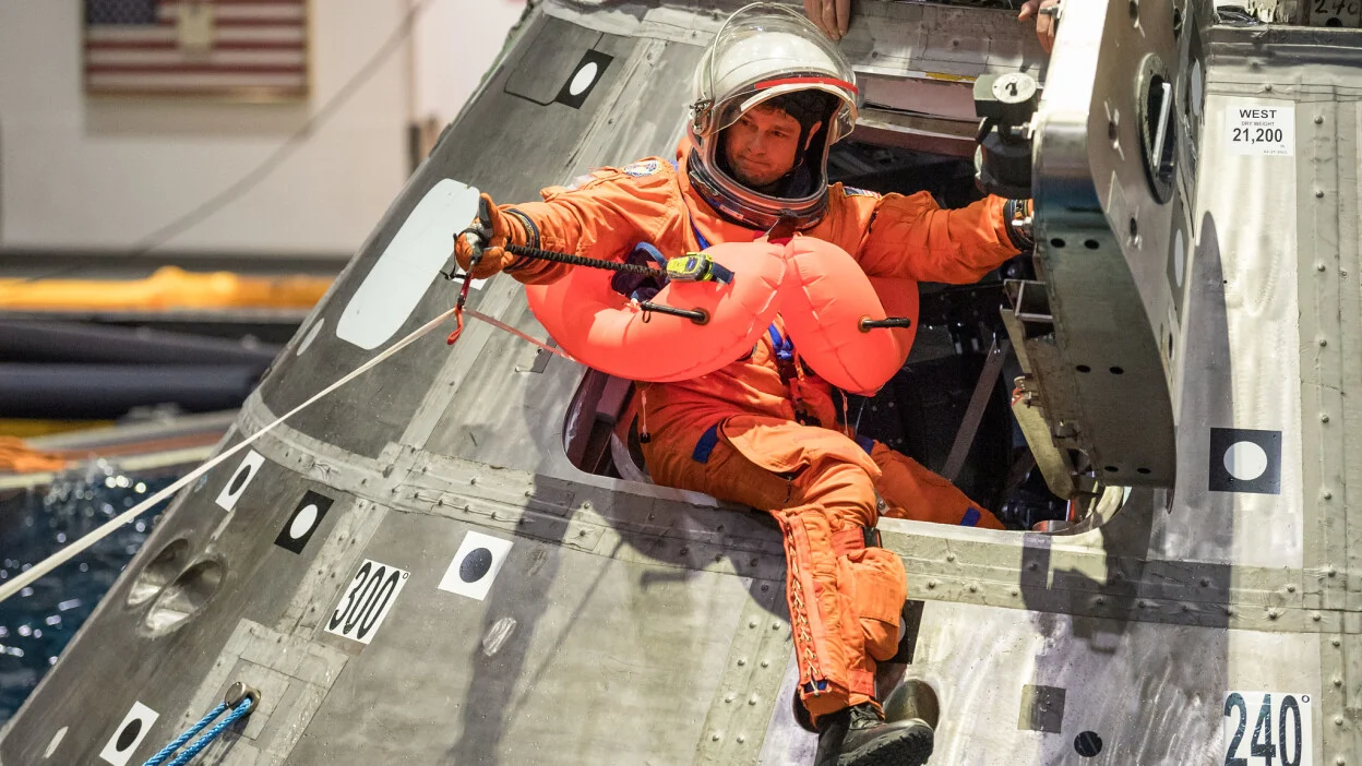 Artemis II Commander Reid Wiseman rehearsing the water recovering procedures from the Orion spacecraft