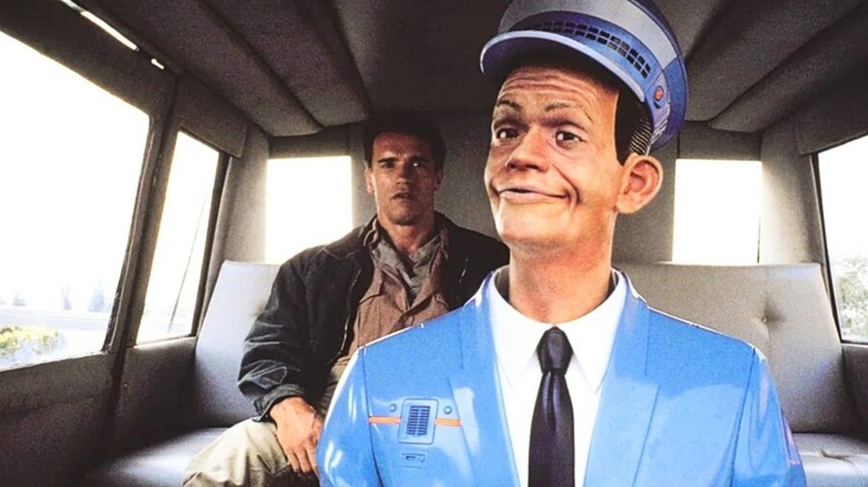 Johnny Cab transporting Quaid in a futuristic taxi