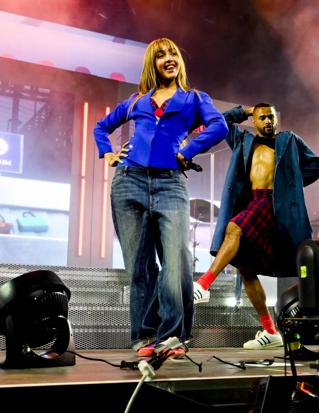 Image may contain Clothing Pants Adult Person Lighting Jeans Performer Solo Performance Footwear and Shoe