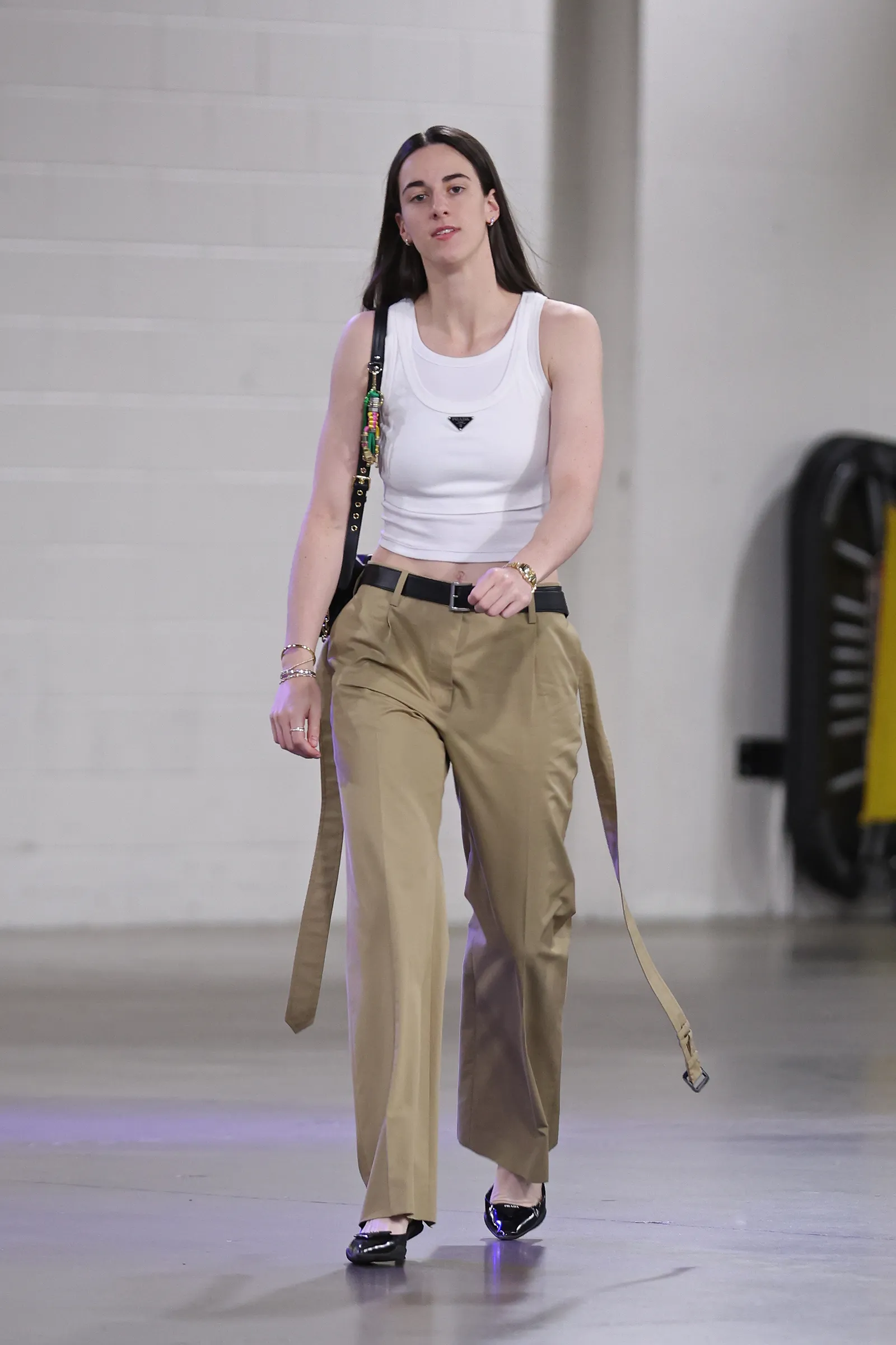 Image may contain Clothing Pants Accessories Belt Adult and Person