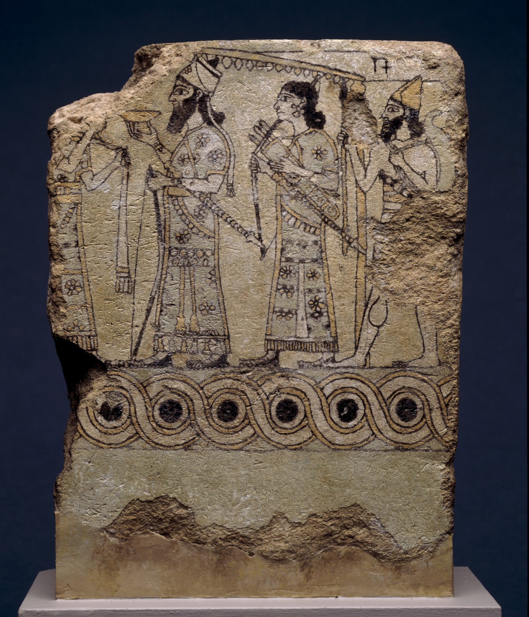 Azulejo de pared esmaltado que, originalmente, formaba parta de una escena narrativa que representaba al rey asirio (posiblemente, Asurnasirpal II), 875-850 a. de C., palacio noroeste, Nimrud (Irak).