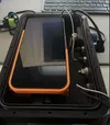 Pixel phone inside a case hooked up to cables