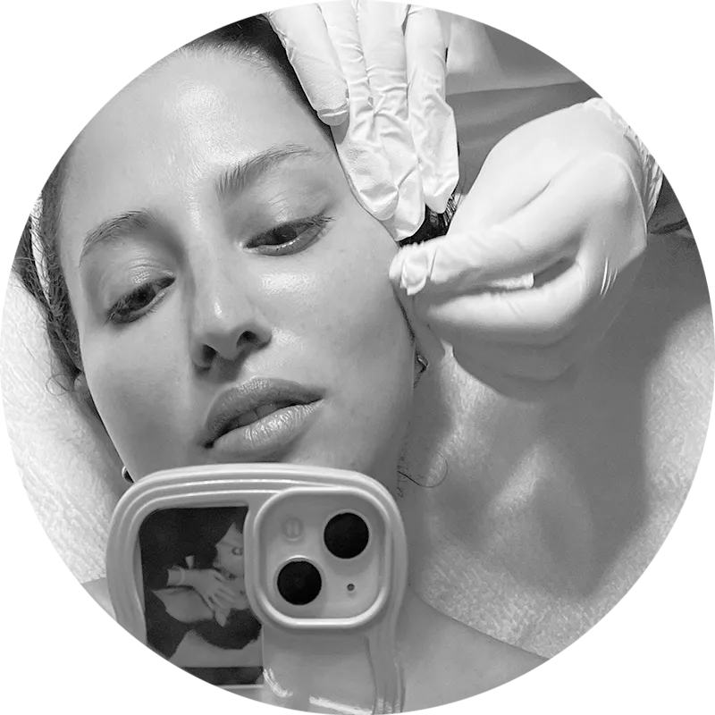 Image may contain Photography Clothing Glove Face Head Person Portrait Adult Body Part Finger Hand and Baby