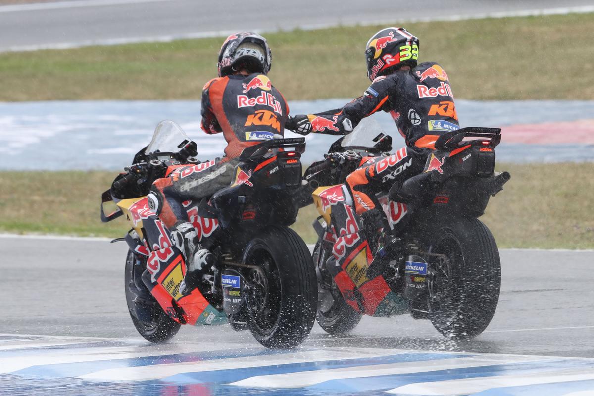 The race started under grey clouds and rain began to fall three laps in, The race started under grey clouds and rain began to fall three laps in,