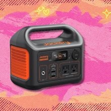 the Jackery Explorer 300 on a pink and orange background