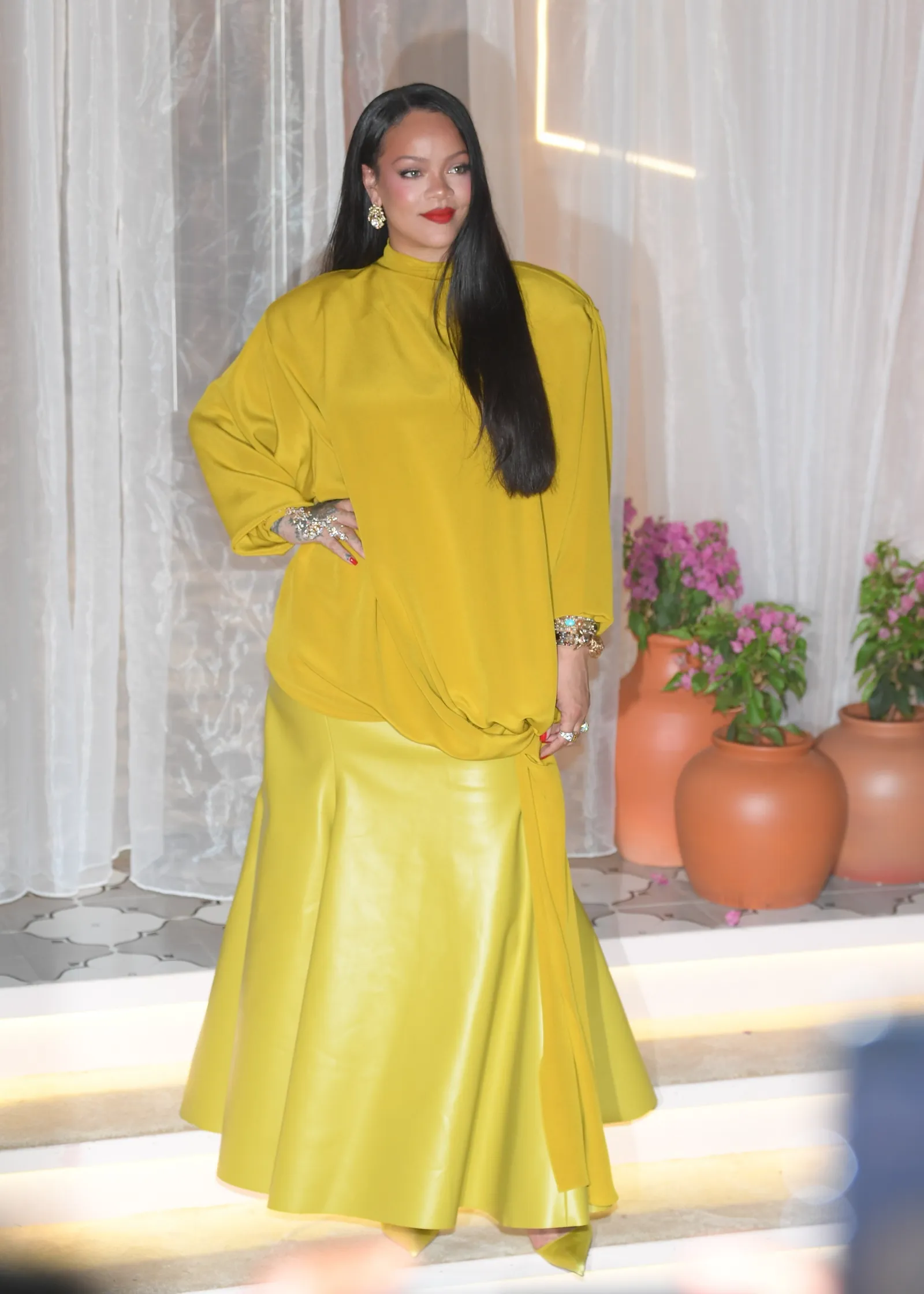 Mumbai INDIA Rihanna lit up the room in a striking yellow ensemble as she attended her Fenty Beauty launch in Mumbai....