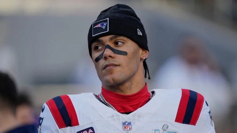 New England Patriots cornerback Christian Gonzalez (0) stands on the sideline before taking on the Seattle Seahawks in the NFL Super Bowl 60 football game, Sunday, Feb. 8, 2026 in Santa Clara, Calif.