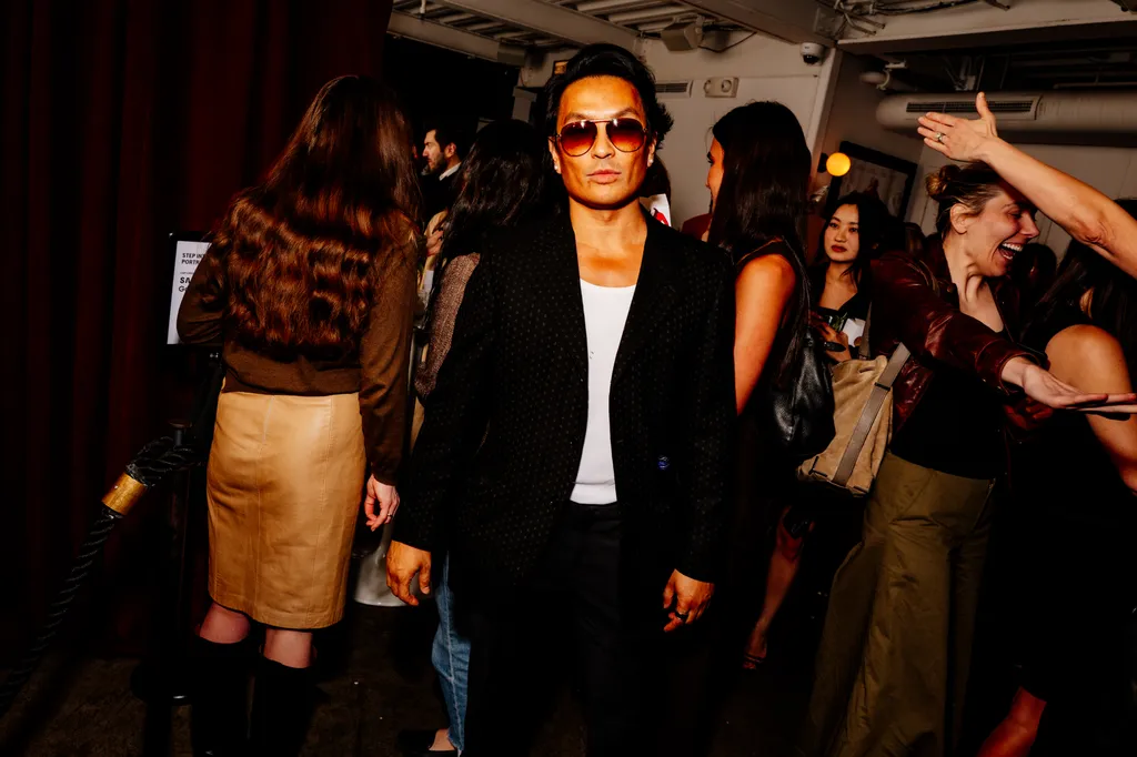 Image may contain Clothing Coat Jacket Accessories Sunglasses Adult Person Fashion Blazer Face Head and Urban