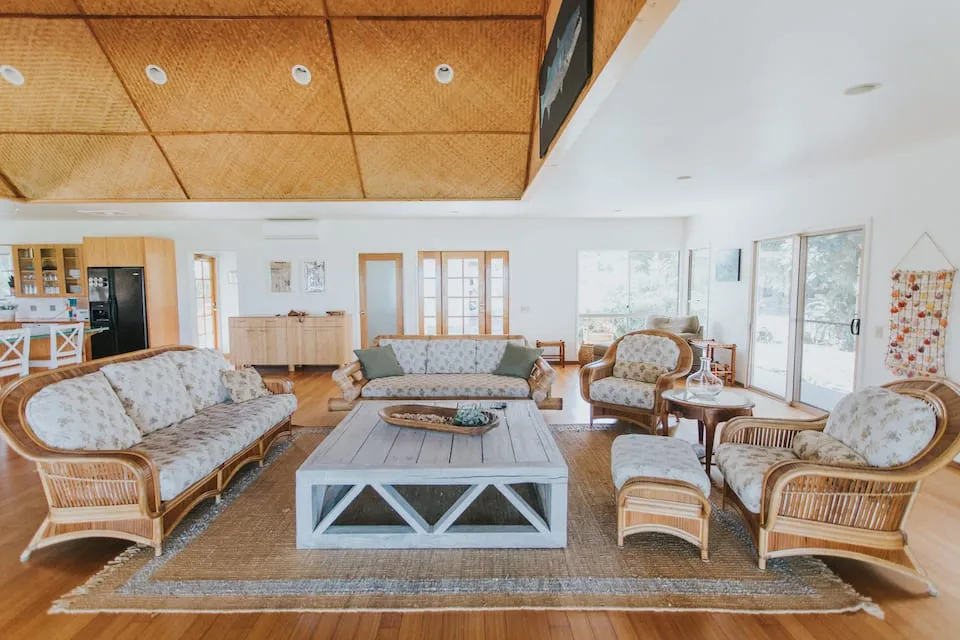 Image may contain Home Decor Furniture Table Coffee Table Rug Chair Couch Indoors and Interior Design