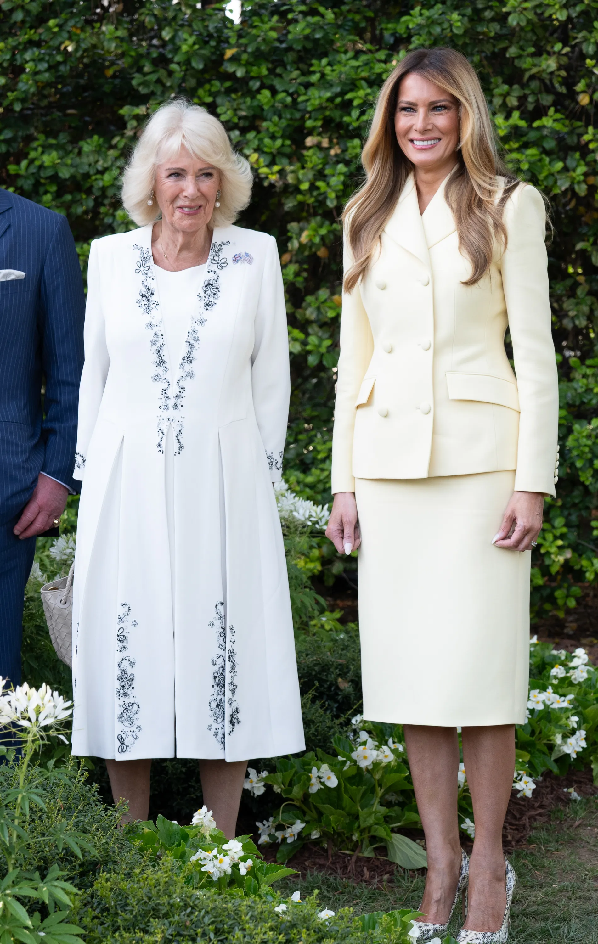 Image may contain Melania Trump Person Adult Blazer Clothing Coat Jacket Formal Wear and Suit