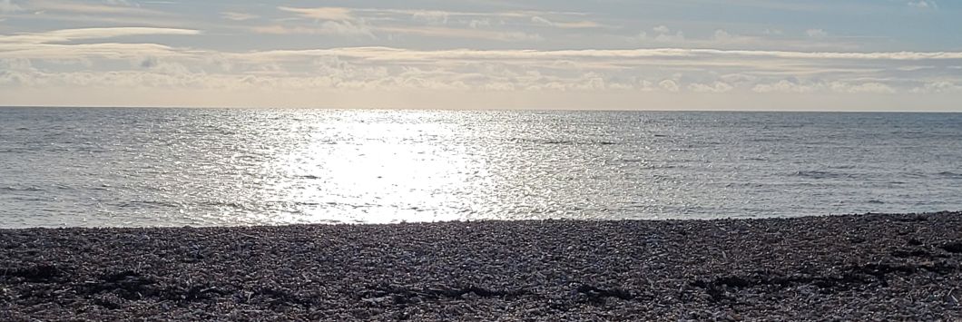 A view of Hastings beach and the English Channel on a bright New Years Day in 2026