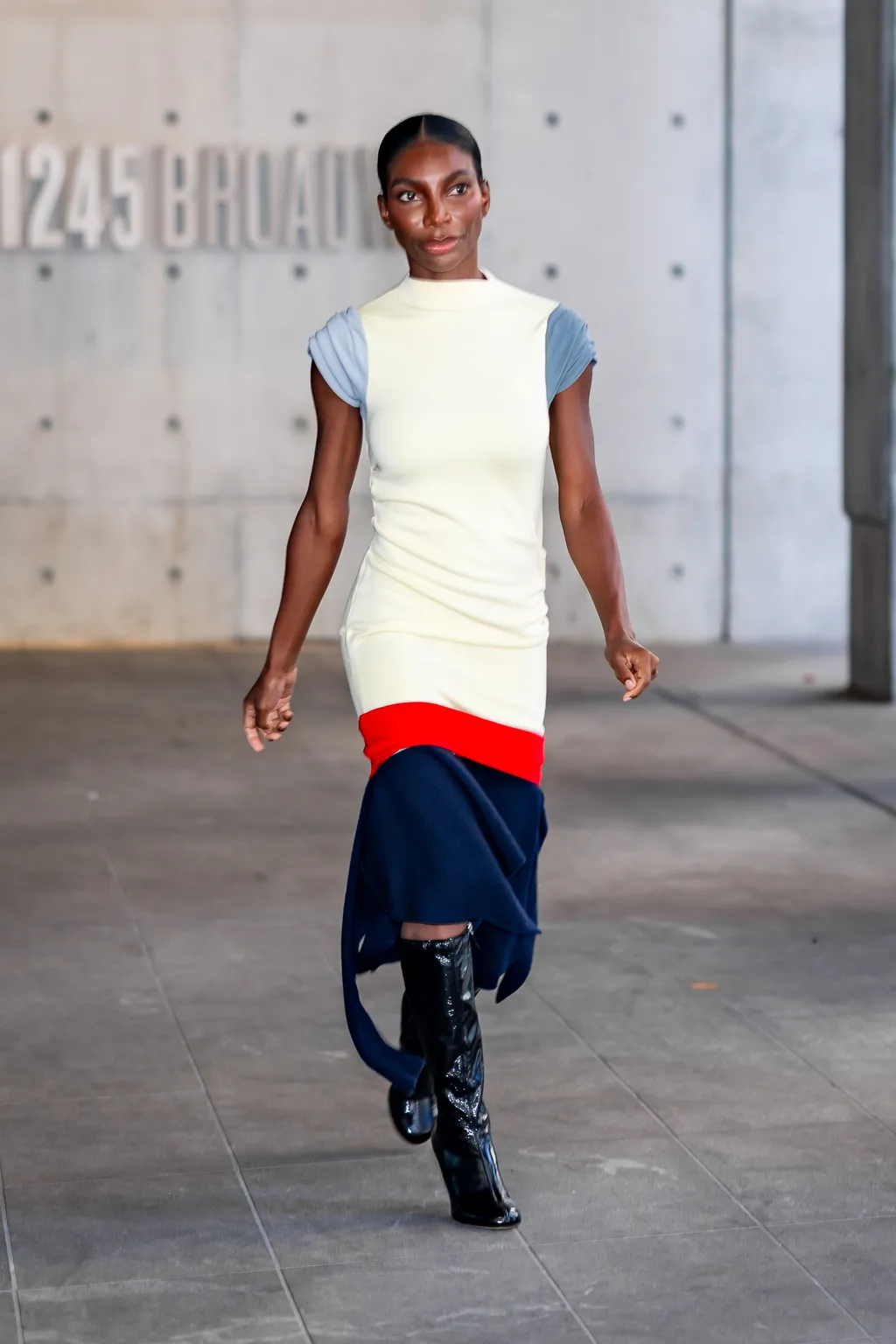 Image may contain Michaela Coel Clothing Sleeve Person Teen Footwear Shoe and Vest