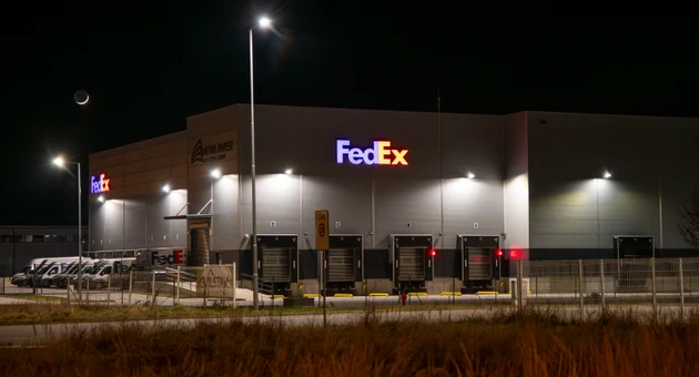 FedEx sign on a office building in Nitra. Slovakia. FedEx Corporation is an American global courier delivery services company.
