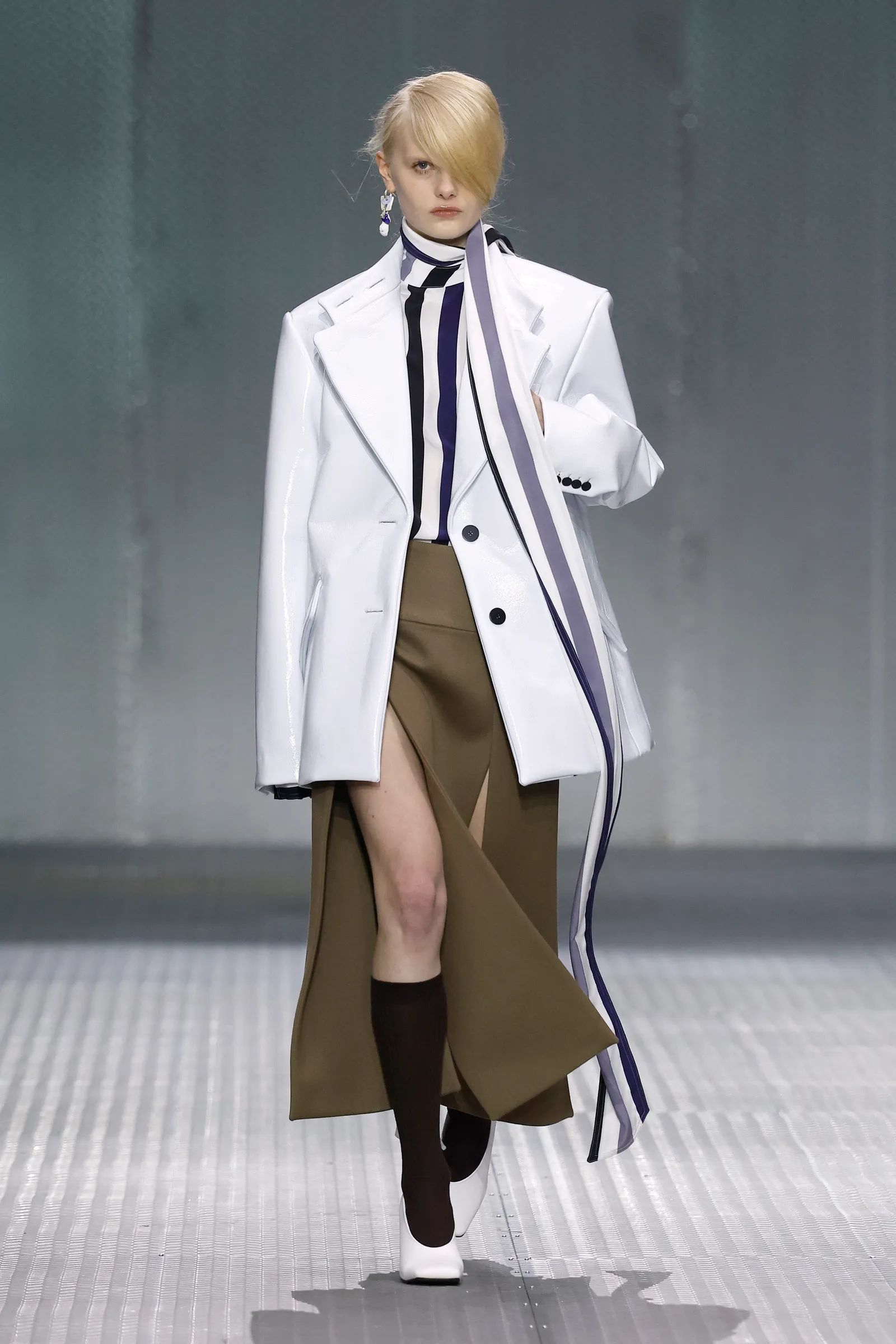 Image may contain Clothing Coat Overcoat and Lab Coat