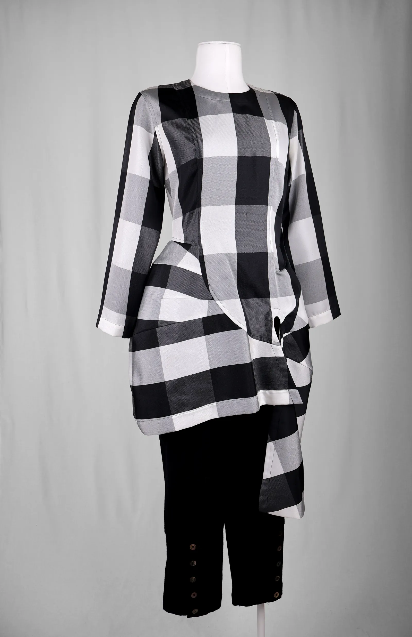 Image may contain Blouse Clothing Long Sleeve Sleeve Shirt and Coat