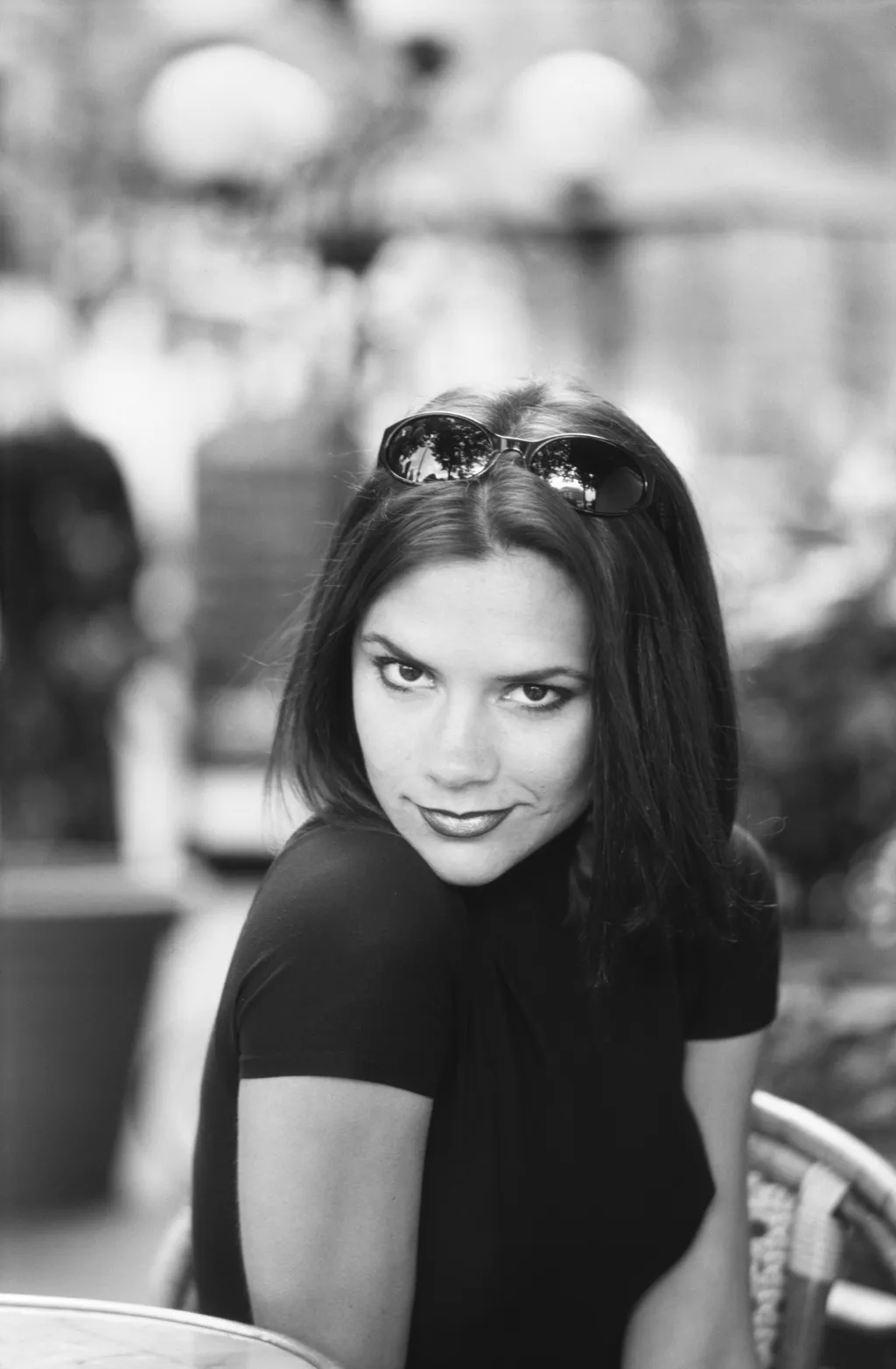 Image may contain Victoria Beckham Face Head Person Photography Portrait Happy Smile Accessories and Sunglasses. English...