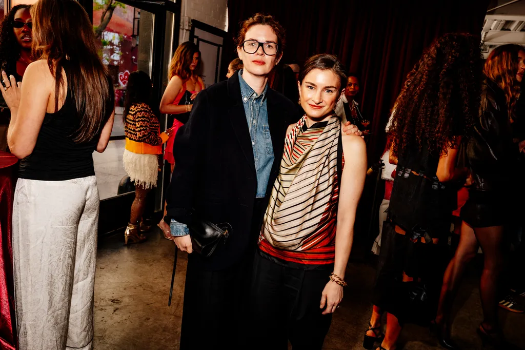 Image may contain Stefanie Martini Amy Adams Blazer Clothing Coat Jacket Fashion Adult Person and Photobombing