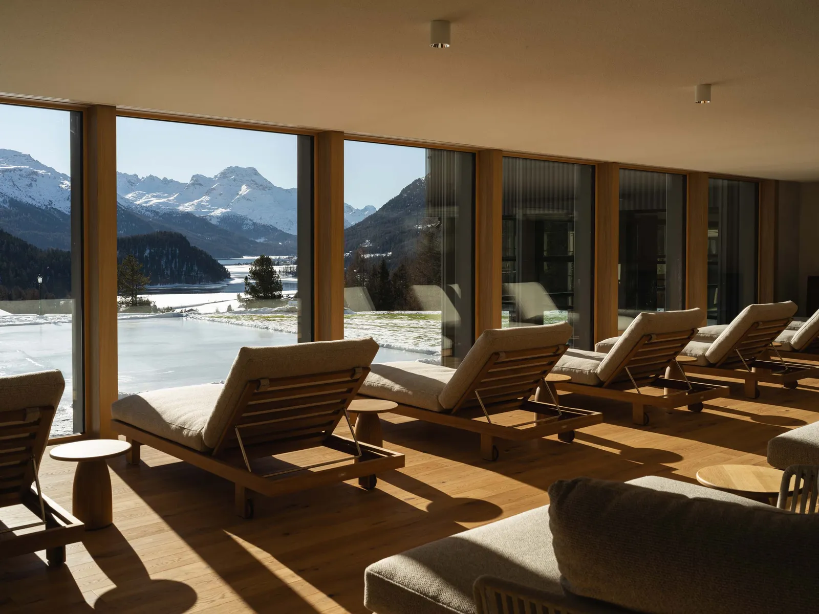 Image may contain Chair Furniture Nature Outdoors Scenery Wood Lamp Architecture Building Hotel Resort and Couch