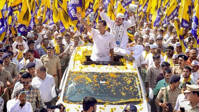 Arvind Kejriwal, Delhi Chief Minister and national coordinator of the AAP, during a roadshow in Gujarat on November 6. Kejriwal is likely to project himself increasingly as both a Hindu nationalist and an economic populist. Arvind Kejriwal, Delhi Chief Minister and national coordinator of the AAP, during a roadshow in Gujarat on November 6. Kejriwal is likely to project himself increasingly as both a Hindu nationalist and an economic populist.