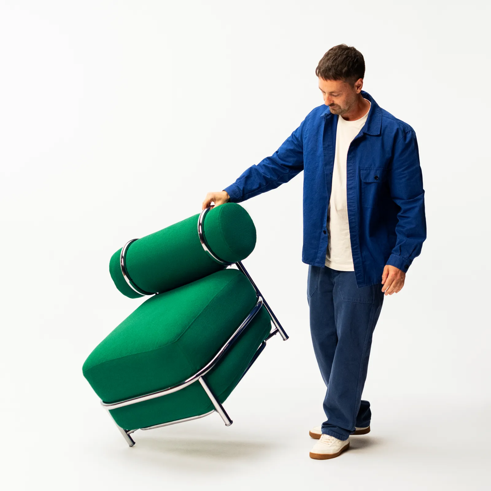 Image may contain Aaron Stainthorpe Clothing Coat Baggage Adult and Person