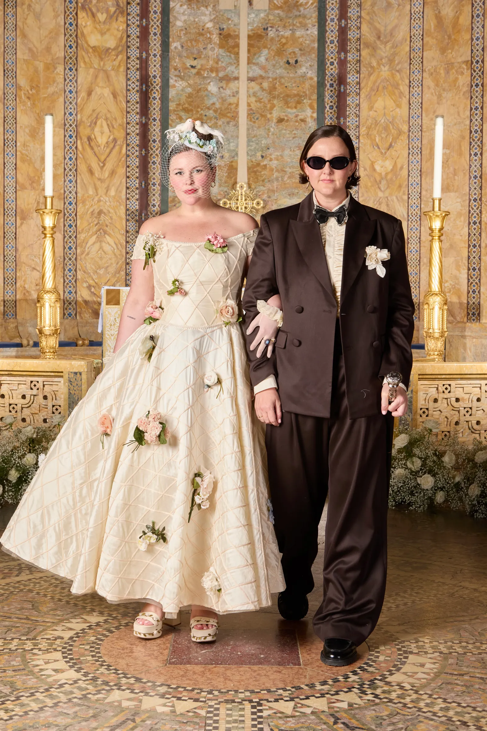Image may contain Adult Person Wedding Candle Clothing Formal Wear and Suit