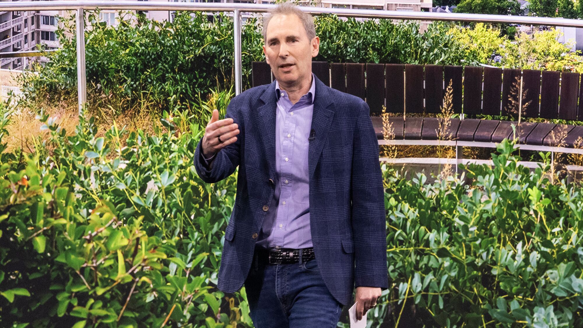 Andy Jassy hand raised explaining 