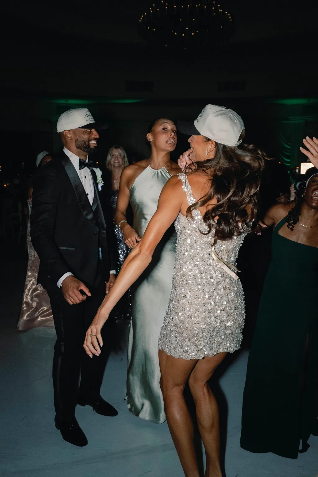 Image may contain Blazer Clothing Coat Jacket Formal Wear Suit Person Photobombing Adult Wedding Dress and Urban