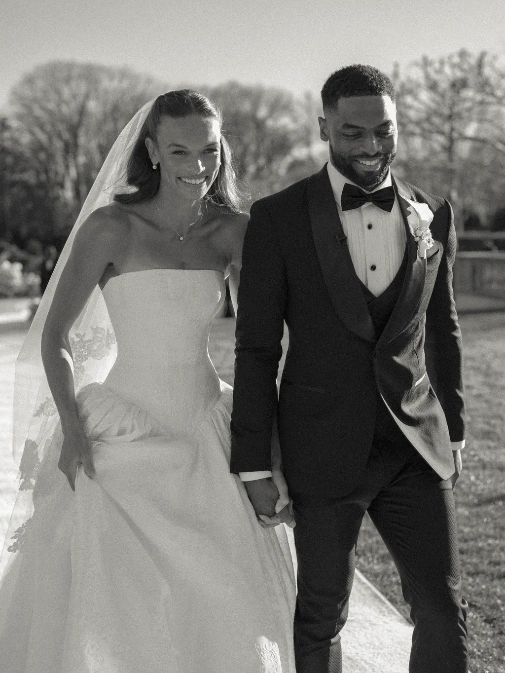 Image may contain Carl Lumbly Clothing Formal Wear Suit Dress Blazer Coat Jacket Fashion Gown and Wedding