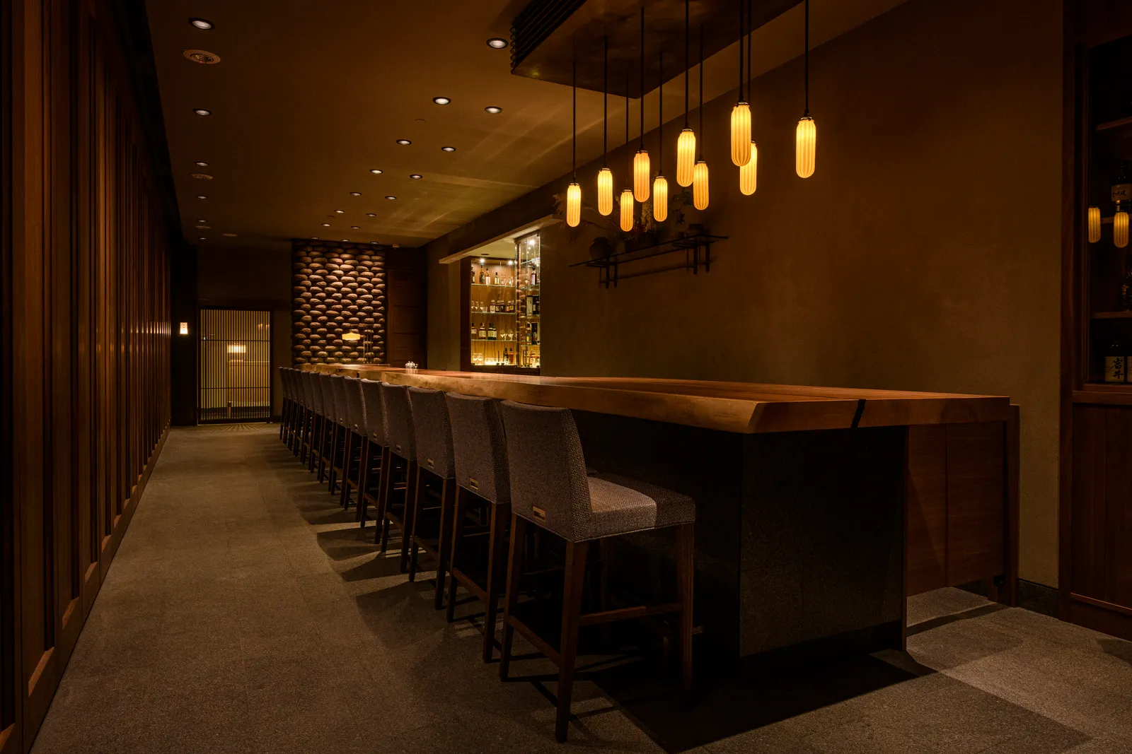 Image may contain Chair Furniture Alcohol Bar Bar Counter Beverage and Pub