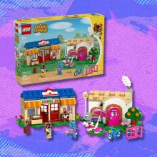 lego animal crossing nook’s cranny & rosie's house set against a purple patterned background
