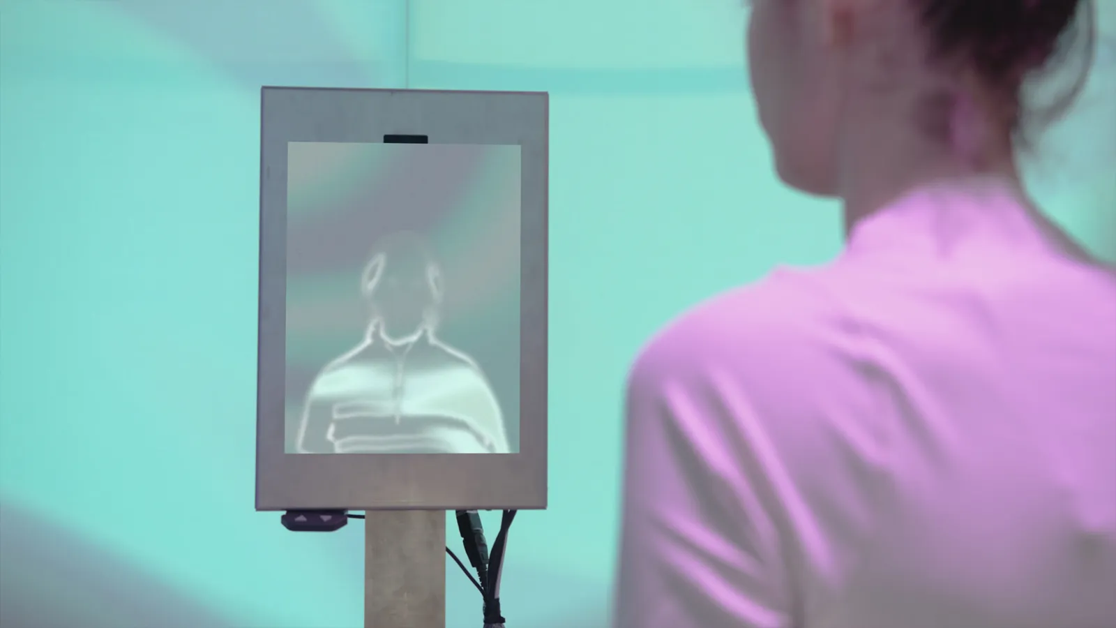 Image may contain Electronics Screen Computer Hardware Hardware Monitor Person Adult Computer TV Face and Head