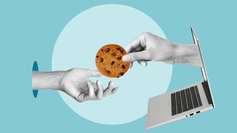 Artistic image of a hand reaching from a computer to give a person a cookie