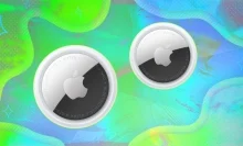 Apple AirTags on green background
