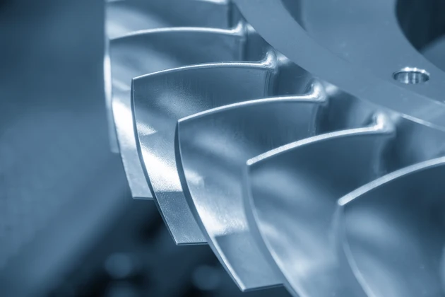 Close up scene the jet engine parts in the light blue scene.