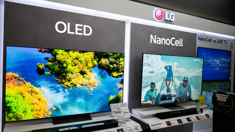 An LG NanoCell LED-LCD next to an LG OLED at a retail outlet.