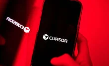 Cursor AI logo on phone screen