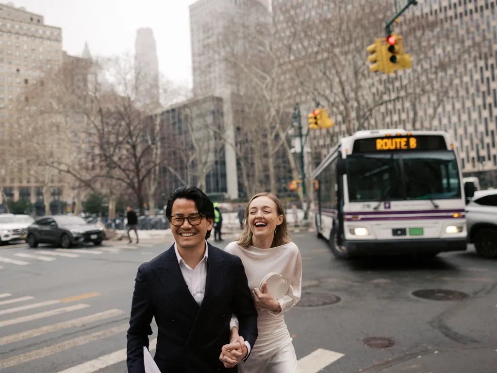 Image may contain Kiren Rijiju Blazer Clothing Coat Jacket City Formal Wear Suit Face Head Person and Photography
