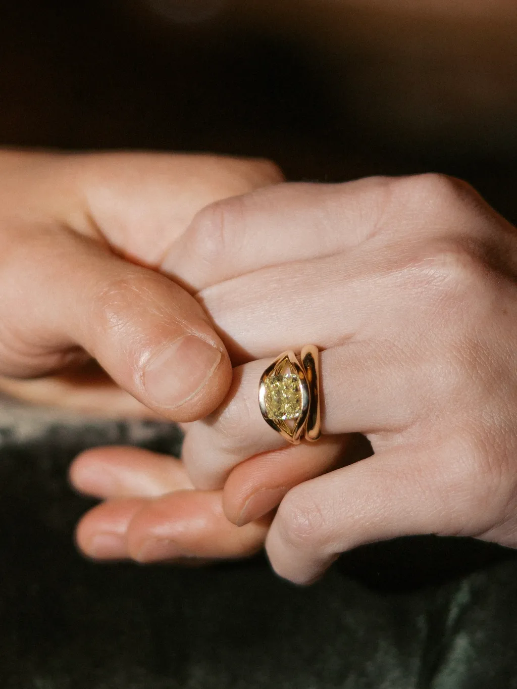Image may contain Accessories Jewelry Ring Body Part Finger Hand Person Diamond and Gemstone