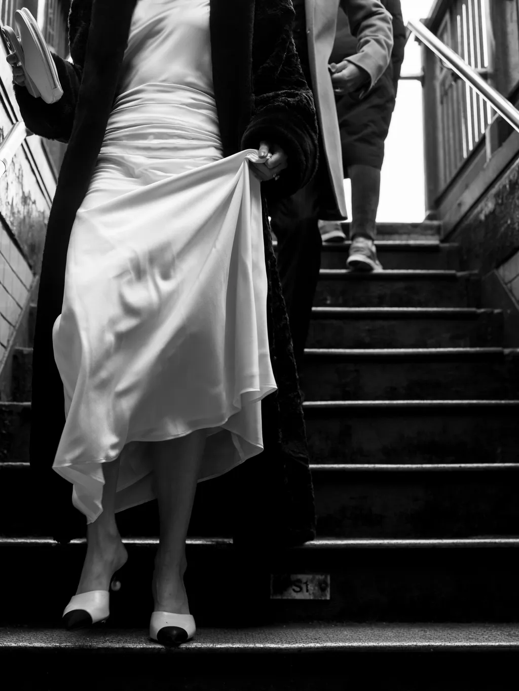 Image may contain Architecture Building House Housing Staircase Clothing Dress Handrail Adult Person and Wedding