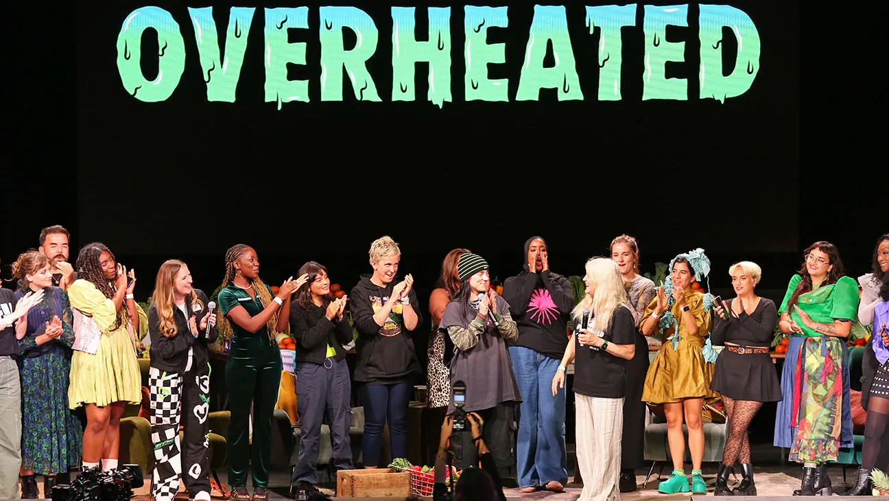 Billie Eilish (C) and her mother Maggie Baird (6R) pose with panelists onstage during Overheated, a one-off climate activism event presented by Support + Feed and Billie Eilish at Flipper's Roller Boogie Palace on August 30, 2023 in London, England.