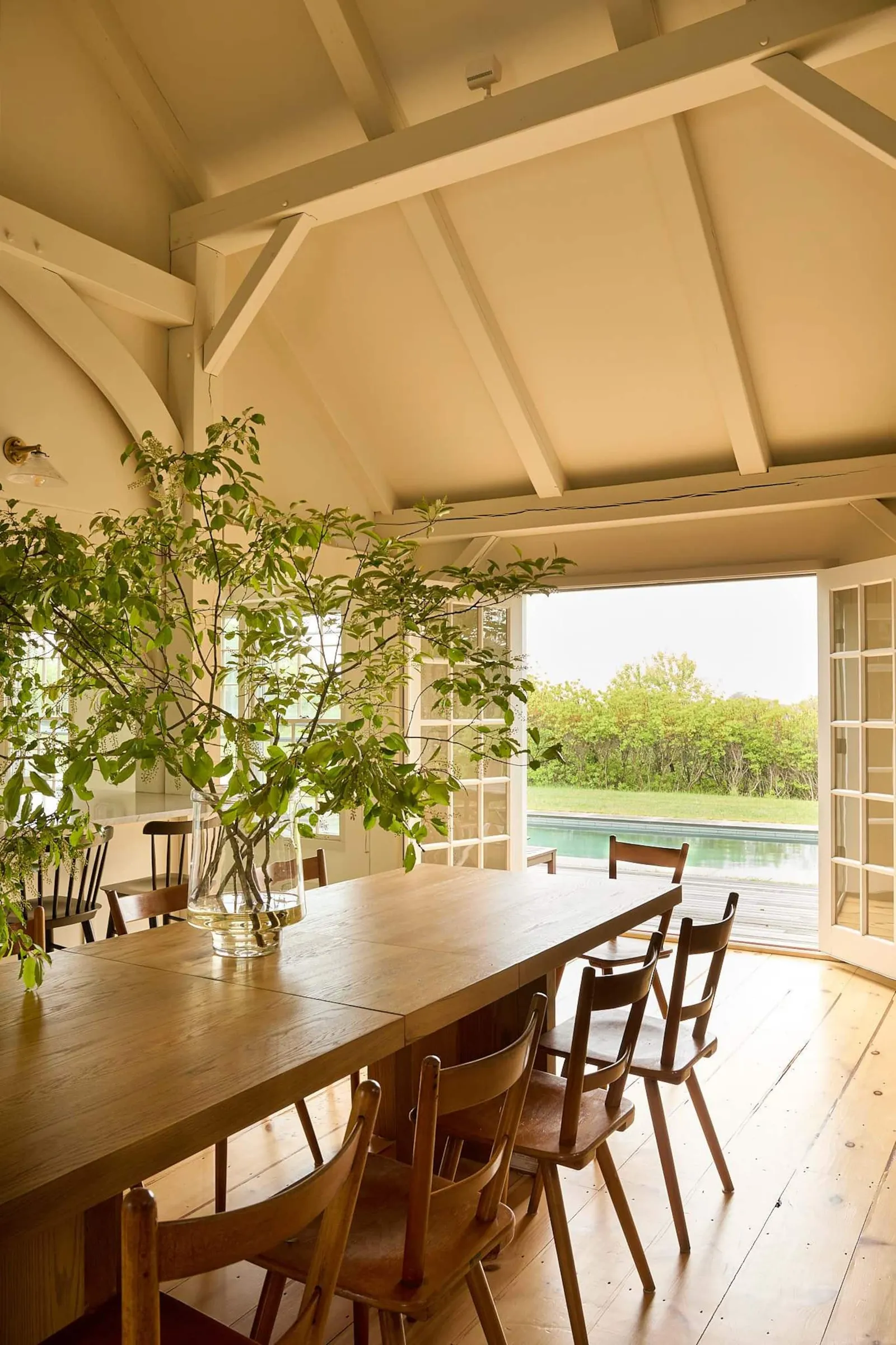 Image may contain Indoors Interior Design Dining Table Furniture Table Architecture Building Dining Room and Room