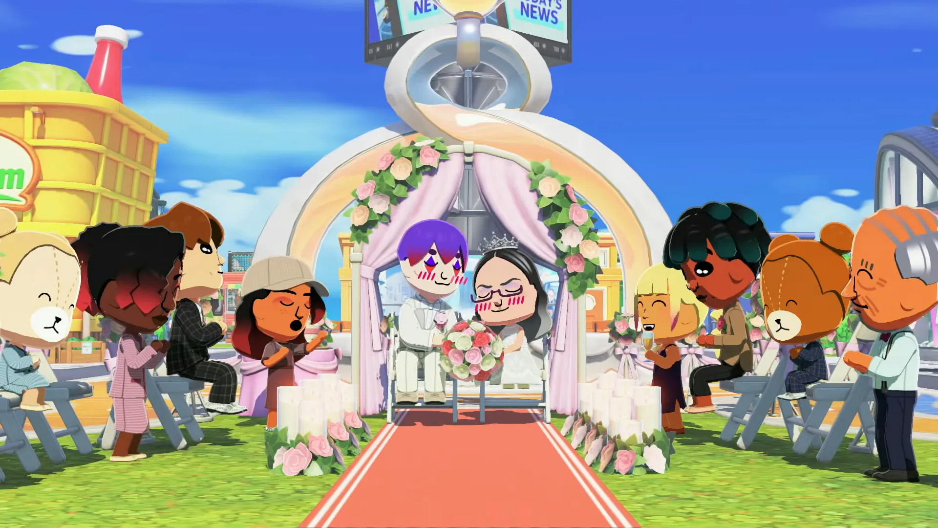 A wedding scene in the game Tomodachi Life features two characters sitting at the altar surrounded by guests in a colorful, animated setting.